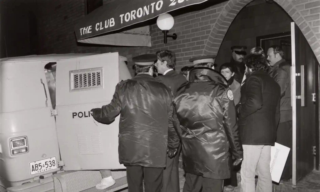 Police raid the Club bathhoue in Toronto on 6 February 1981.